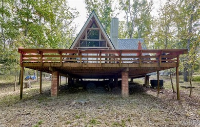 Escape to your own secluded wooded retreat! This completely on Innsbrook Resort Golf Course in Missouri - for sale on GolfHomes.com, golf home, golf lot