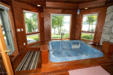 Welcome home to this one of a kind custom Lake Mohawk waterfront on Lake Mohawk Golf Club in Ohio - for sale on GolfHomes.com, golf home, golf lot