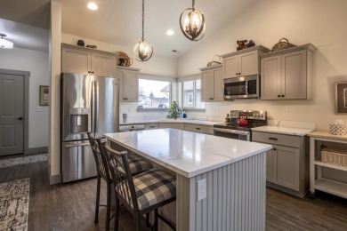 Enjoy single-level living in the popular Village Greens Golf on Village Greens Golf Club in Montana - for sale on GolfHomes.com, golf home, golf lot