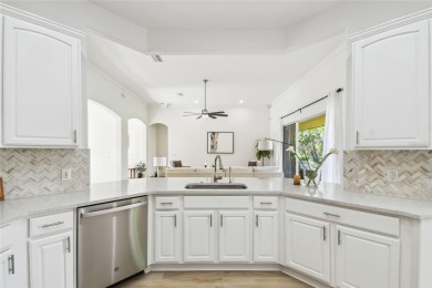 This stunning, fully REMODELED barrel tile roof Verona model on Stonegate Golf Club in Florida - for sale on GolfHomes.com, golf home, golf lot