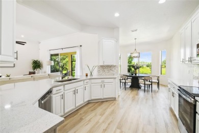 This stunning, fully REMODELED barrel tile roof Verona model on Stonegate Golf Club in Florida - for sale on GolfHomes.com, golf home, golf lot
