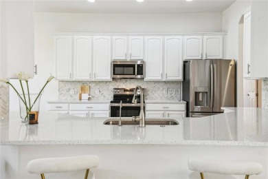 This stunning, fully REMODELED barrel tile roof Verona model on Stonegate Golf Club in Florida - for sale on GolfHomes.com, golf home, golf lot