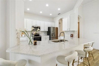 This stunning, fully REMODELED barrel tile roof Verona model on Stonegate Golf Club in Florida - for sale on GolfHomes.com, golf home, golf lot