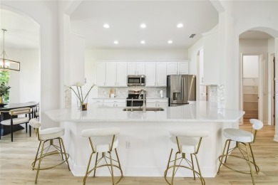 This stunning, fully REMODELED barrel tile roof Verona model on Stonegate Golf Club in Florida - for sale on GolfHomes.com, golf home, golf lot