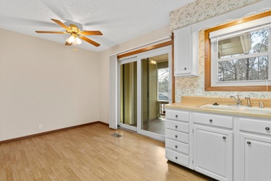 Welcome to this charming bungalow nestled in the heart of Hot on Cortez Golf Course in Arkansas - for sale on GolfHomes.com, golf home, golf lot