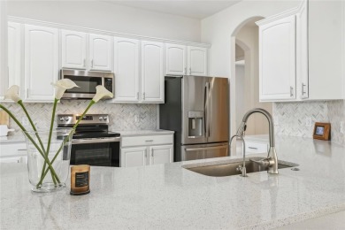 This stunning, fully REMODELED barrel tile roof Verona model on Stonegate Golf Club in Florida - for sale on GolfHomes.com, golf home, golf lot