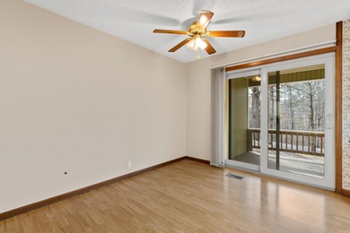 Welcome to this charming bungalow nestled in the heart of Hot on Cortez Golf Course in Arkansas - for sale on GolfHomes.com, golf home, golf lot