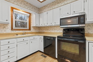 Welcome to this charming bungalow nestled in the heart of Hot on Cortez Golf Course in Arkansas - for sale on GolfHomes.com, golf home, golf lot