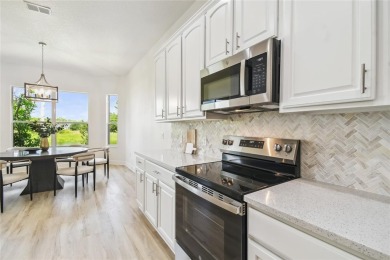 This stunning, fully REMODELED barrel tile roof Verona model on Stonegate Golf Club in Florida - for sale on GolfHomes.com, golf home, golf lot