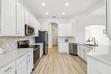 This stunning, fully REMODELED barrel tile roof Verona model on Stonegate Golf Club in Florida - for sale on GolfHomes.com, golf home, golf lot