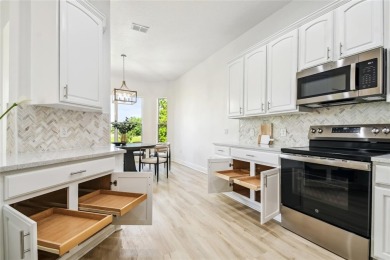 This stunning, fully REMODELED barrel tile roof Verona model on Stonegate Golf Club in Florida - for sale on GolfHomes.com, golf home, golf lot