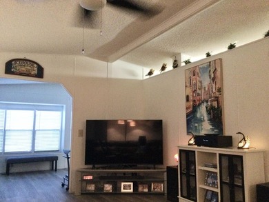 Meticulously maintained home in the much sought after Spanish on Spanish Lakes I in Florida - for sale on GolfHomes.com, golf home, golf lot