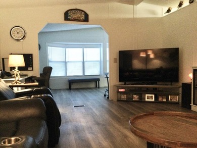 Meticulously maintained home in the much sought after Spanish on Spanish Lakes I in Florida - for sale on GolfHomes.com, golf home, golf lot