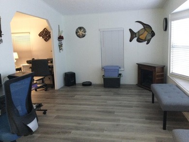 Meticulously maintained home in the much sought after Spanish on Spanish Lakes I in Florida - for sale on GolfHomes.com, golf home, golf lot