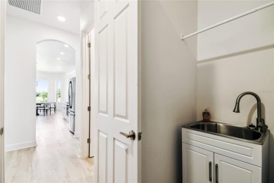 This stunning, fully REMODELED barrel tile roof Verona model on Stonegate Golf Club in Florida - for sale on GolfHomes.com, golf home, golf lot