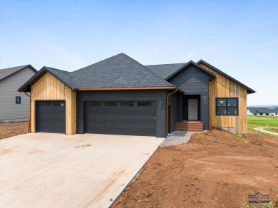 Discover the elegance of this brand-new construction home on Elkhorn Ridge Golf Course in South Dakota - for sale on GolfHomes.com, golf home, golf lot