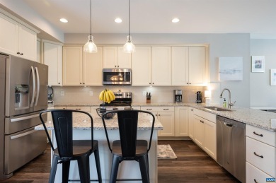 Live where you play in this stylish, low-maintenance townhome in on Old Trail Golf Club in Virginia - for sale on GolfHomes.com, golf home, golf lot