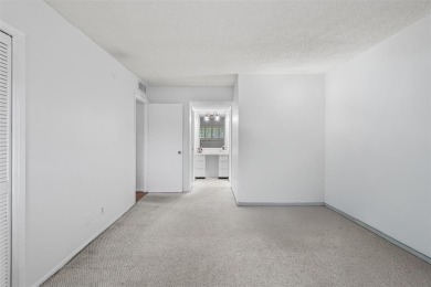 Stop renting and start owning! This move-in ready flip or on Palm-Aire Country Club and Resort - The Oaks in Florida - for sale on GolfHomes.com, golf home, golf lot