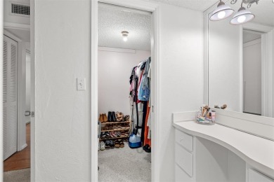 Stop renting and start owning! This move-in ready flip or on Palm-Aire Country Club and Resort - The Oaks in Florida - for sale on GolfHomes.com, golf home, golf lot
