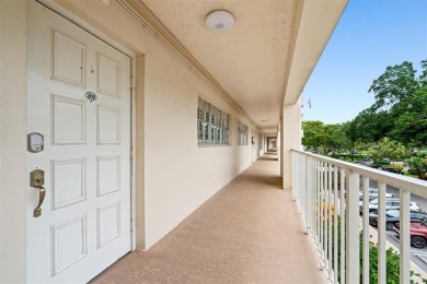 Stop renting and start owning! This move-in ready flip or on Palm-Aire Country Club and Resort - The Oaks in Florida - for sale on GolfHomes.com, golf home, golf lot