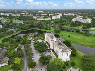 Stop renting and start owning! This move-in ready flip or on Palm-Aire Country Club and Resort - The Oaks in Florida - for sale on GolfHomes.com, golf home, golf lot