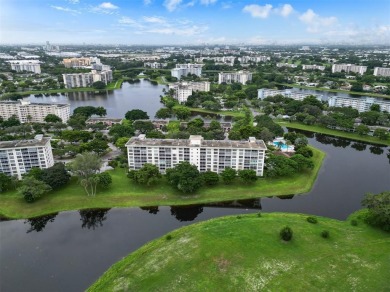 Stop renting and start owning! This move-in ready flip or on Palm-Aire Country Club and Resort - The Oaks in Florida - for sale on GolfHomes.com, golf home, golf lot