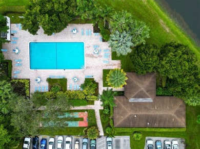 Stop renting and start owning! This move-in ready flip or on Palm-Aire Country Club and Resort - The Oaks in Florida - for sale on GolfHomes.com, golf home, golf lot