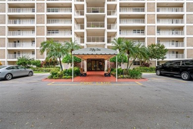 Stop renting and start owning! This move-in ready flip or on Palm-Aire Country Club and Resort - The Oaks in Florida - for sale on GolfHomes.com, golf home, golf lot