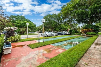 Stop renting and start owning! This move-in ready flip or on Palm-Aire Country Club and Resort - The Oaks in Florida - for sale on GolfHomes.com, golf home, golf lot