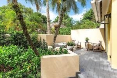 This beautifully renovated 3-bedroom Murifield townhome offers a on Palm Beach Polo and Country Club in Florida - for sale on GolfHomes.com, golf home, golf lot