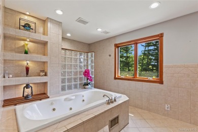 Welcome to this beautifully maintained 4-bedroom, 2-bath ranch on Mahopac Golf Club in New York - for sale on GolfHomes.com, golf home, golf lot