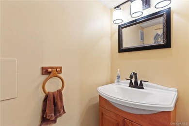 Welcome to this beautifully maintained 4-bedroom, 2-bath ranch on Mahopac Golf Club in New York - for sale on GolfHomes.com, golf home, golf lot
