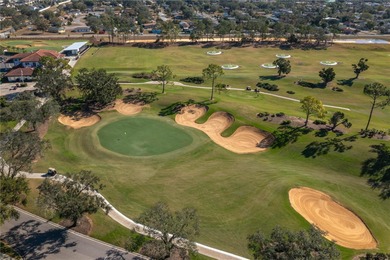 3 Bedroom, 2 Bathroom Home with a Pool - Overlooking Golf Course on Southern Dunes Golf and Country Club in Florida - for sale on GolfHomes.com, golf home, golf lot