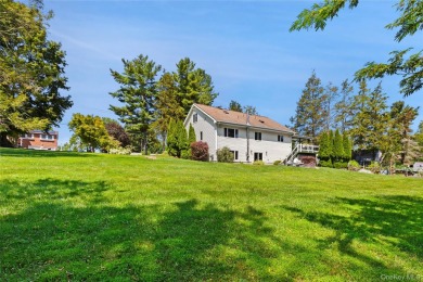 Welcome to this beautifully maintained 4-bedroom, 2-bath ranch on Mahopac Golf Club in New York - for sale on GolfHomes.com, golf home, golf lot