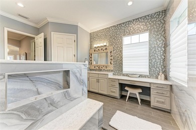 A truly remarkable, one-of-a-kind estate residence awaits in the on River Strand Golf and Country Club At Heritage Harbour  in Florida - for sale on GolfHomes.com, golf home, golf lot