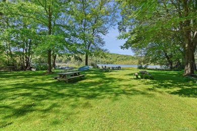 Welcome to this beautifully maintained 4-bedroom, 2-bath ranch on Mahopac Golf Club in New York - for sale on GolfHomes.com, golf home, golf lot