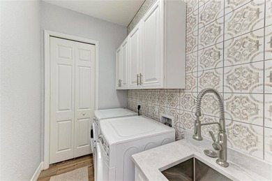 A truly remarkable, one-of-a-kind estate residence awaits in the on River Strand Golf and Country Club At Heritage Harbour  in Florida - for sale on GolfHomes.com, golf home, golf lot