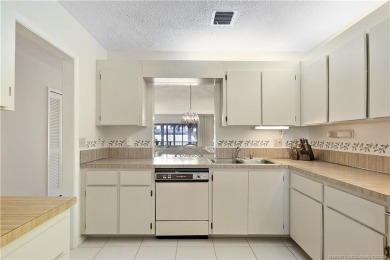 Bright and open second floor corner unit in Banyan House.  This on Martin County Golf Course in Florida - for sale on GolfHomes.com, golf home, golf lot