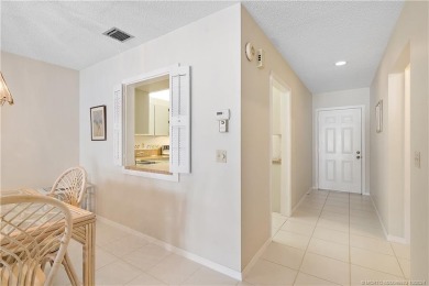 Bright and open second floor corner unit in Banyan House.  This on Martin County Golf Course in Florida - for sale on GolfHomes.com, golf home, golf lot