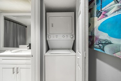 Wake up to peaceful water views and end your evenings surrounded on Wynmoor Golf Course in Florida - for sale on GolfHomes.com, golf home, golf lot