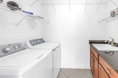 From the moment you step through the door, this MINTO Capistrano on Sandpiper Golf Club in Florida - for sale on GolfHomes.com, golf home, golf lot