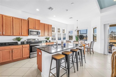 From the moment you step through the door, this MINTO Capistrano on Sandpiper Golf Club in Florida - for sale on GolfHomes.com, golf home, golf lot