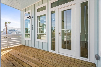 Welcome to 120 Lotus Lane, a beautifully designed two-story home on Palmilla Beach Golf Club in Texas - for sale on GolfHomes.com, golf home, golf lot