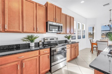 From the moment you step through the door, this MINTO Capistrano on Sandpiper Golf Club in Florida - for sale on GolfHomes.com, golf home, golf lot