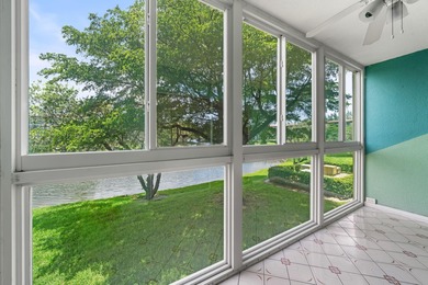 Wake up to peaceful water views and end your evenings surrounded on Wynmoor Golf Course in Florida - for sale on GolfHomes.com, golf home, golf lot