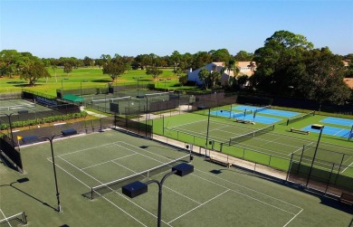 Welcome to The Preserves at Palm Aire! This beautiful 2 bedroom on Palm Aire Country Club of Sarasota in Florida - for sale on GolfHomes.com, golf home, golf lot