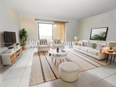 Spacious 2 bedroom, 2 bathroom home filled with natural sunlight on Normandy Shores Golf Course in Florida - for sale on GolfHomes.com, golf home, golf lot