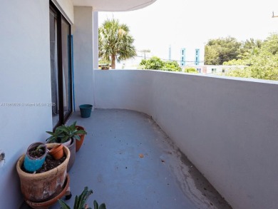 Spacious 2 bedroom, 2 bathroom home filled with natural sunlight on Normandy Shores Golf Course in Florida - for sale on GolfHomes.com, golf home, golf lot