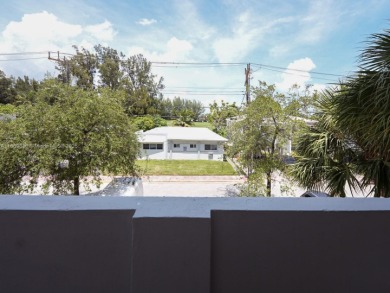 Spacious 2 bedroom, 2 bathroom home filled with natural sunlight on Normandy Shores Golf Course in Florida - for sale on GolfHomes.com, golf home, golf lot