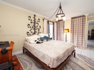 Spacious 2 bedroom, 2 bathroom home filled with natural sunlight on Normandy Shores Golf Course in Florida - for sale on GolfHomes.com, golf home, golf lot